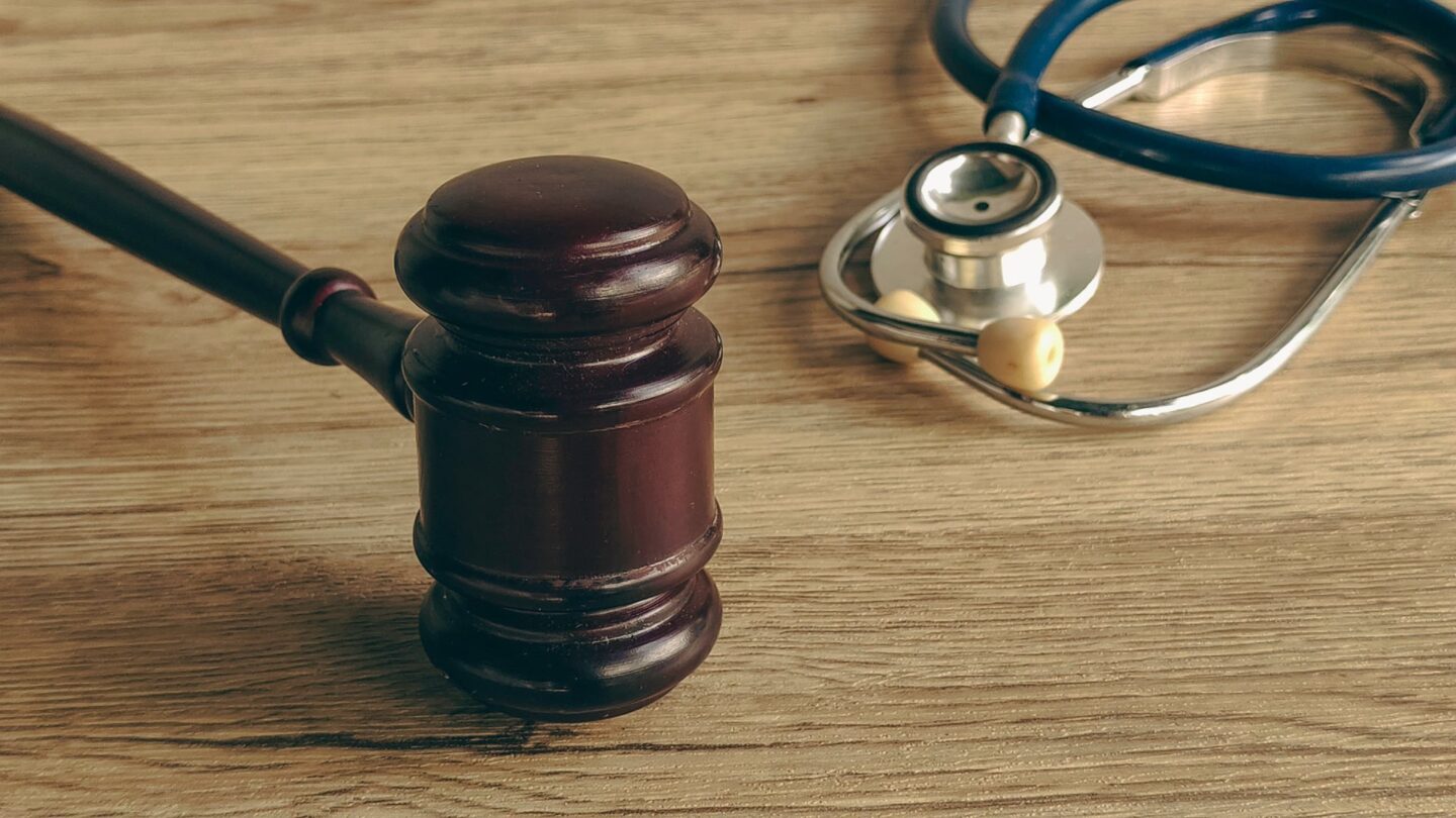 A gavel and stethoscope